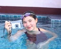 Girl in water glasses close with underwater camera Royalty Free Stock Photo