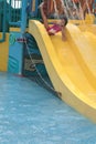 Girl on water slide Royalty Free Stock Photo