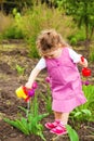 Girl watering flowers