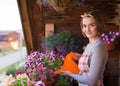 Girl watering flowers Royalty Free Stock Photo