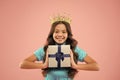 Girl wear crown. Princess manners. Award concept. Gift box. Winner of beauty competition. International beauty contest Royalty Free Stock Photo