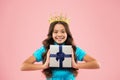 Girl wear crown. Princess manners. Award concept. Gift box. Winner of beauty competition. International beauty contest Royalty Free Stock Photo