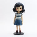Cartoon Girl Figurine With Blue Hair And Striped Dress