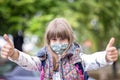 Girl wearing face mask during corona virus and flu outbreak.