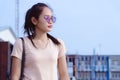 Girl wearing glasses optical filter in outdoor.