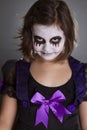 The girl wearing halloween make up