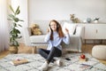 Girl wearing headphones enjoying music with closed eyes Royalty Free Stock Photo