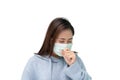 Girl wearing blue winter coat and mask againt flu and covid-19,corona virus and cough