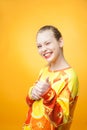 Girl wearing orange printed sweatshirt