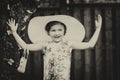 Girl Wearing Oversized Sun Hat - Vintage Royalty Free Stock Photo