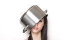 Girl wearing a pot as hat