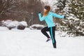 Running girl wearing sportswear, winter fitness Royalty Free Stock Photo