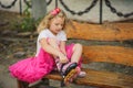 Girl wears roller skates. Royalty Free Stock Photo