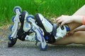 Girl wears roller skates Royalty Free Stock Photo