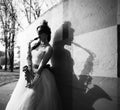 Girl in a wedding dress with a saxophone