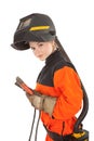 Girl welder worker in welding mask