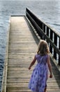 Girl on the wharf Royalty Free Stock Photo