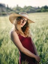 Girl in wheat field, backlit Royalty Free Stock Photo