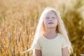 Girl in wheat field