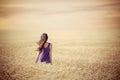 Girl in wheat field Royalty Free Stock Photo