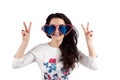 Girl on a white background with big glasses and her hands up. Royalty Free Stock Photo