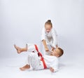 The girl with a white belt makes throws judo Royalty Free Stock Photo