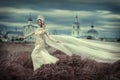 Girl in white dress on background of the Church Royalty Free Stock Photo