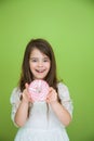 Girl in a white dress is going to eat a sweet donut Royalty Free Stock Photo