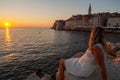 A girl in Rovinj town at sunset, Istra, Croatia