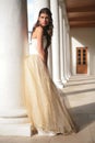 Girl in white-golden gown of the bride Royalty Free Stock Photo