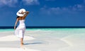 Girl in white on a sandbank in the Maldives Royalty Free Stock Photo