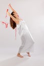 Girl white silk nightie pulled backwards red thread on white background