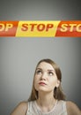 Girl in white and STOP line. Royalty Free Stock Photo