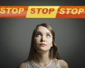 Girl in white and STOP line. Royalty Free Stock Photo