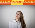 Girl in white and STOP line. Royalty Free Stock Photo