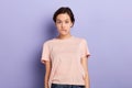 Girl with white t-shirt and jeans having indecisive confused expression Royalty Free Stock Photo