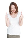 Girl in a white T-shirt shows thumb up isolated on white background Royalty Free Stock Photo