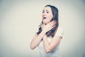 A girl in a white T-shirt suffocates from an allergic reaction. Toned Royalty Free Stock Photo