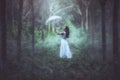 A girl with a white umbrella stands in forest Royalty Free Stock Photo