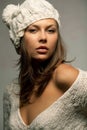 Girl in white wool and cap