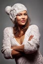 Girl in white wool and cap