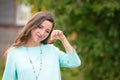 A girl who loves cherries. Portrait of a beautiful young woman who holds cherry in her hands and smiles. prenatal vitamins Royalty Free Stock Photo