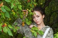 Girl and wild apple tree