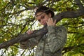 Girl and wild apple tree