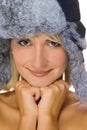 Girl in winter fur-cap Royalty Free Stock Photo