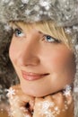 Girl in winter fur-cap Royalty Free Stock Photo