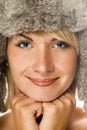 Girl in winter fur-cap Royalty Free Stock Photo