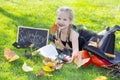 Girl in a witch costume for the Halloween holiday.