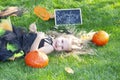 Girl in a witch costume for the Halloween holiday.