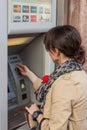 Girl withdrawing money from ATM